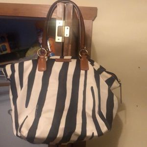 Gently used bag. Smoke free home. No marks or stains.